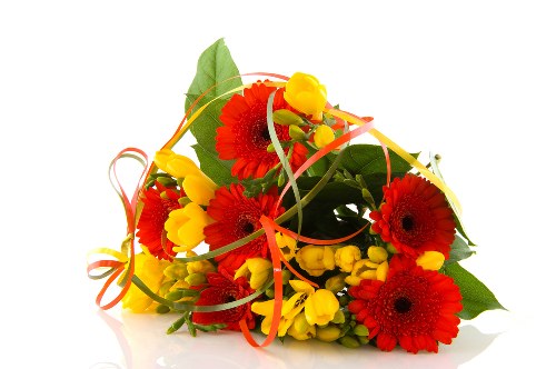 Happy customer receiving a flower delivery at home